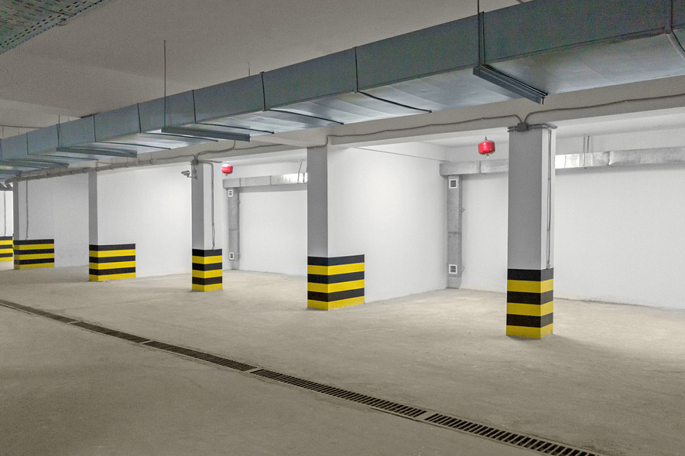Видеонаблюдение в подземном паркинге. Севастополь подземный паркинг. Подземные парковки Севастополя. Крытая парковка с круглыми колоннами.